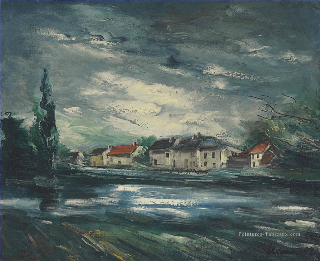 Village près de la rivière Maurice de Vlaminck Peintures à l'huile
